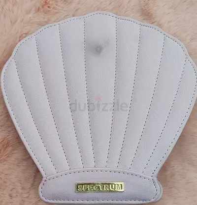 White Shell-Shaped Cosmetic Pouch by Spectrum