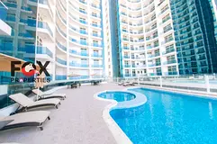 A refined two-bedroom apartment in Al Waha Towers with modern design, freehold for all nationalities