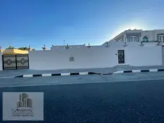 For sale a villa in Sharjah, Al Darari area, large hall with a salon + large council + external anne