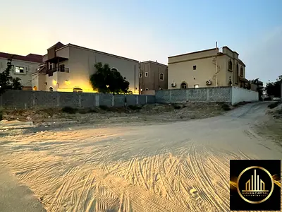 أرض سكني تجاري للبيع في الروضة 2 شارع التلة