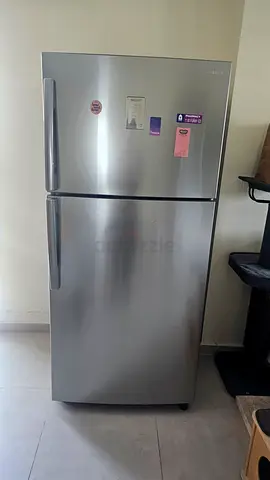 Samsung 2-door Stainless Steel Refrigerator - Good Condition  Price 1000 aed