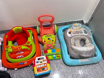 Set of 2 Baby Walkers and Activity Toys - Good Used Condition