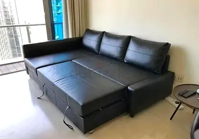 Black Leather L-Shaped Sofa Bed / Sectional - Convertible, Good Condition