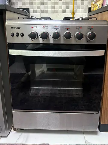 Nikai Gas Cooker: 4-Burner stove with gas oven and grill