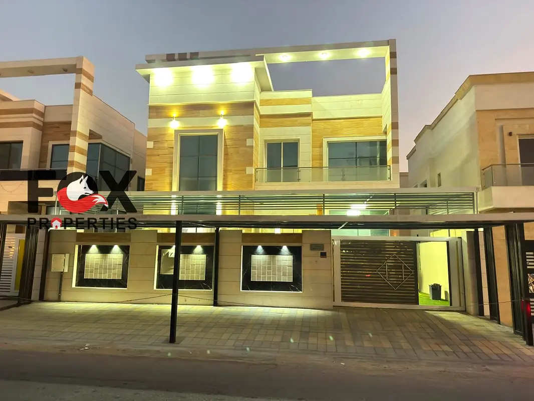 "Villa with all master bedrooms, prime location in Ajman, built-in wardrobes, maid’s room, easy payment options, and an excellent price."