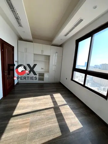 2BR for rent in Al Hamidiya Ajman master bedrooms balcony built in wardrobes 4 or 6 payments near services