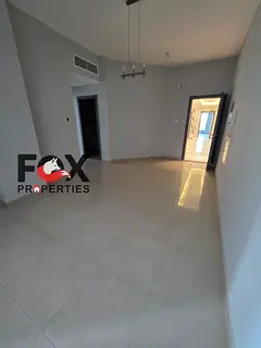 For annual rent, a distinctive apartment in Al Rashidiya 2, in a strategic location next to Falcon T
