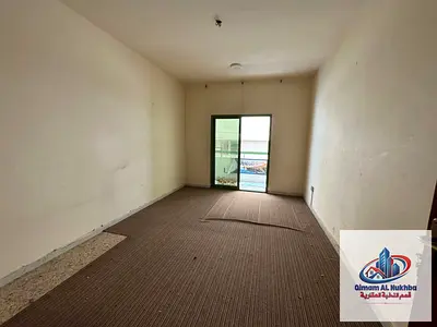 Spacious 1BHK Apartment for Rent in Al Qasimia Al Mahatta with Balcony Central AC and Gas Prime Location