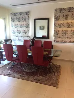 Glass Top Dining Table with 8 Red Chairs and Rug - Good Condition