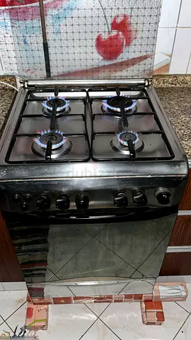 Used 4-Burner Gas Stove with Oven - Good Working Condition