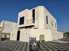 Luxury villa for sale in one of Ajman's most prestigious areas, Al Helio Corner, close to servic