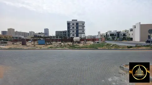 أرض زاوية مميزة للبيع | شارع رئيسي | العالية – عجمان