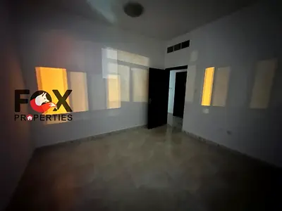 A two-room apartment and a closed hall for rent, featuring a balcony with a sea view, in Al Rashidiya 3 - Al Andalus Street, close to the Grand Mall -