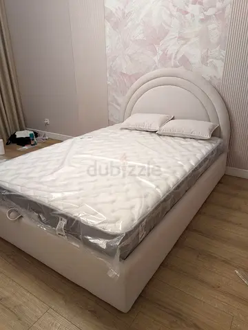 Light Beige Upholstered Bed with Headboard and Mattress