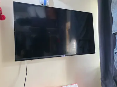 40-43 inch LED Wall-Mounted TV in Good Working Condition