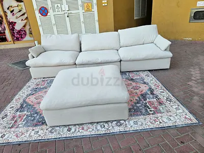 Home Center swin feather filled sofa with footstool