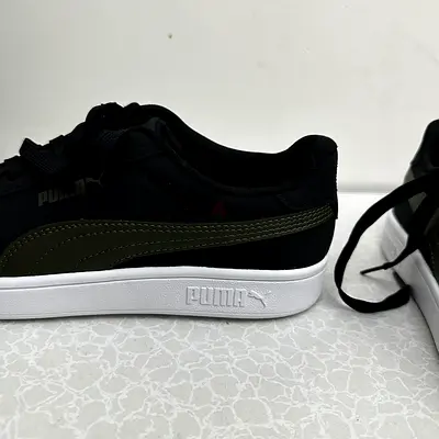 Puma casual sneakers - black with olive stripe.