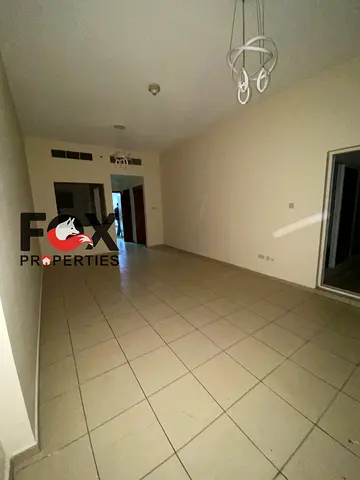 Apartment for sale in Ajman Towers, 1050 sq.ft, open view, with parking, gym, and pool. Price AED 390,000 negotiable