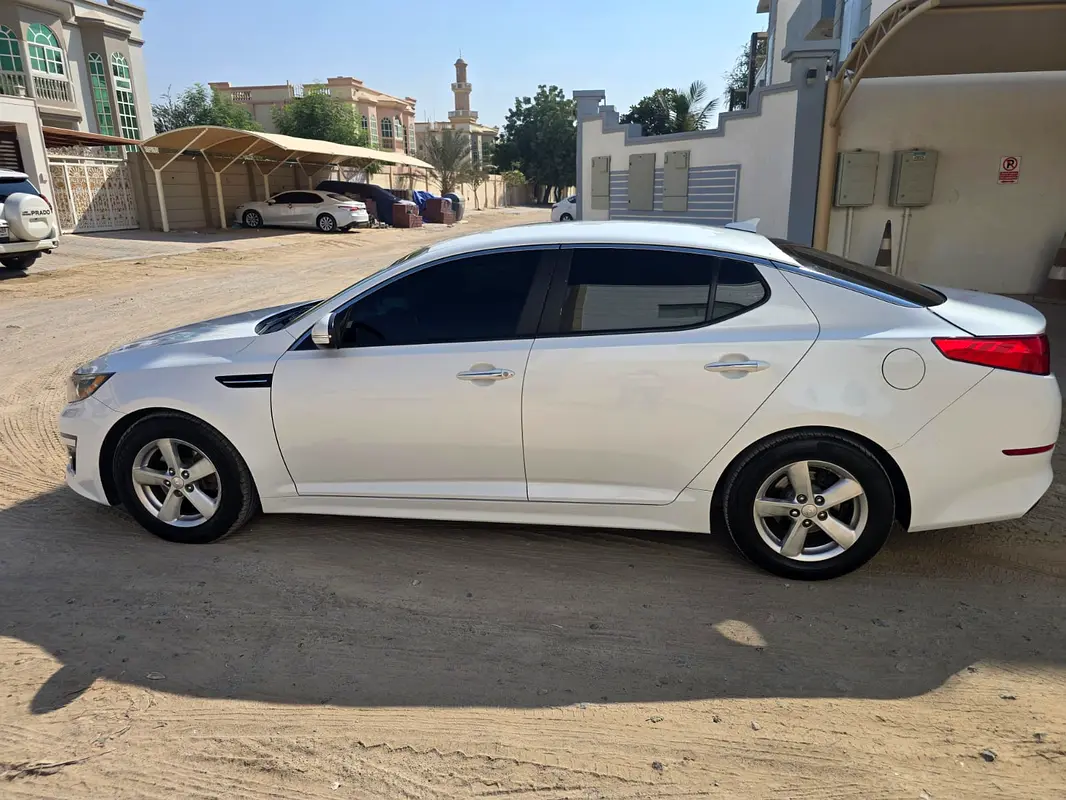 Kia Optima 2015 — photo 1 of 4