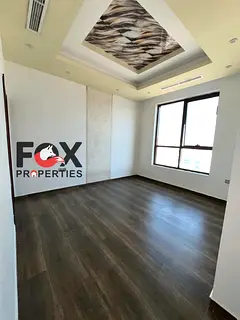 Luxury 1BR apartment with master bedroom, 2 bathrooms, balcony, built-in wardrobes, prime location n