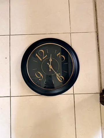 Round Black Wall Clock with Gold Accents - Used