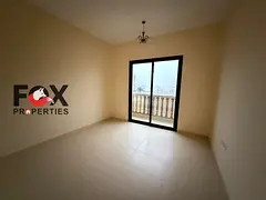 For rent in Ajman - Al Aliyah area, a one-bedroom apartment with two bathrooms and a balcony, with n