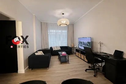 2BR apartment for sale in Garden City Al Hamidiya Ajman, fully furnished, private parking, balcony with nice view, prime location near all services.
