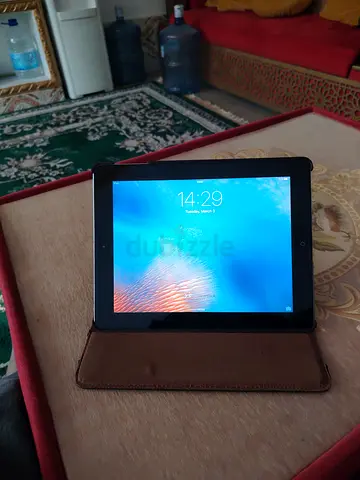 Apple iPad (classic) with brown cover