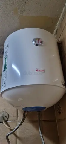 Small wall-mounted electric water heater (used) - 30-50L