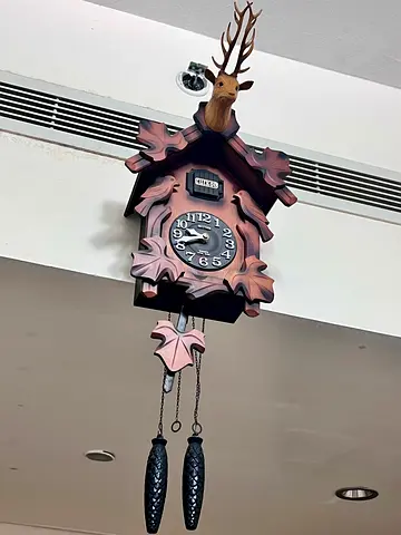 Vintage-style Wooden Cuckoo Wall Clock with Deer Head and Pinecone Weights . Made in Japan