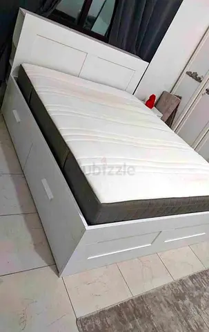Ikea brihmness bed queen size with Ikea mattress