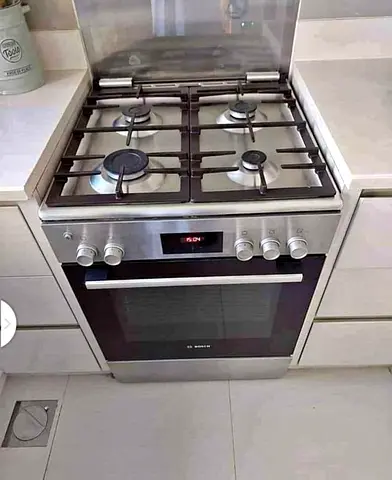 Bosch freestanding gas cooker with oven - stainless steel