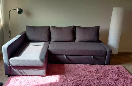 Gray L-shaped Sofa Bed with Storage - Good Condition