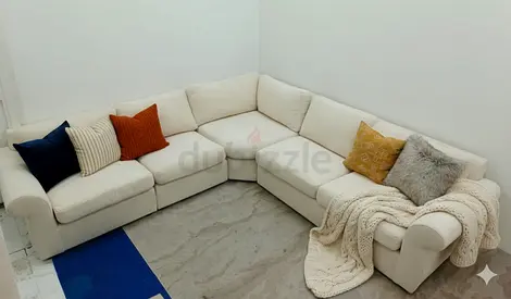 Pottery barn beige color corner sofa