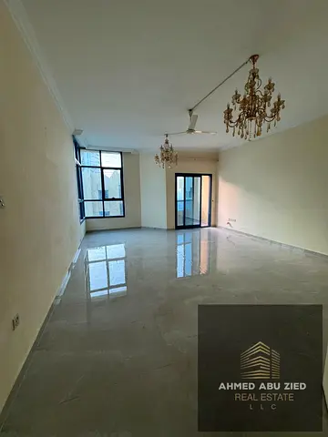 Spacious 2BHK with maid room for annual rent in Rashidiya 1 Ajman balcony central AC 2 bathrooms prime location 42k yearly 4 cheques deposit cheque