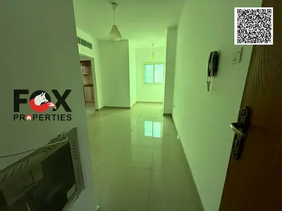 Two bedrooms and a living room for annual rent in Ajman, Al Rashidiya 3, opposite Ajman One Towers. Excellent spaces, super deluxe finishing.