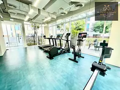 Premium 1-Bedroom Apartment with Smart L-Shaped Kitchen | Full Amenities | Uptown Al Zahia Community