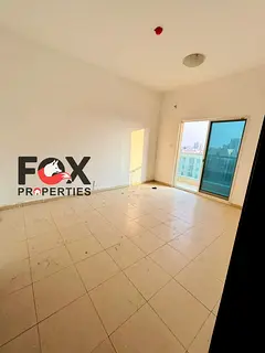 Two bedrooms and a living room for annual rent in City Towers, Al Nuaimiya. Parking and two bathroom