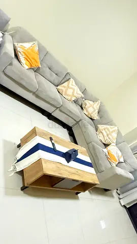 Light Grey L-Shaped Sectional Sofa with Cushions