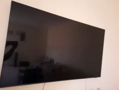 65-inch Flat Screen TV - Wall Mounted, Good Working Condition