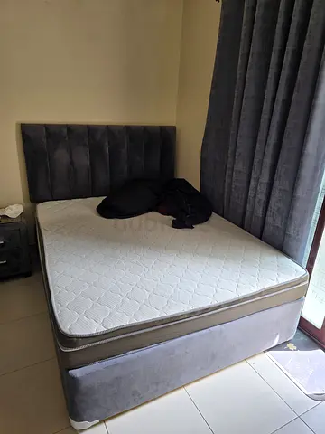 Bed with side table