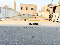 For sale in Sharjah, Al Hooshi area: Residential land plot, 3200 sq ft, on an 18-meter paved road.
