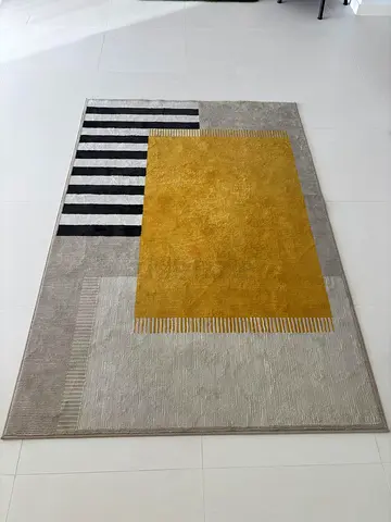 Modern geometric area rug with mustard center (like-new)