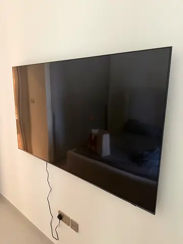 55-inch LED Smart TV - Good Condition, Wall Mounted