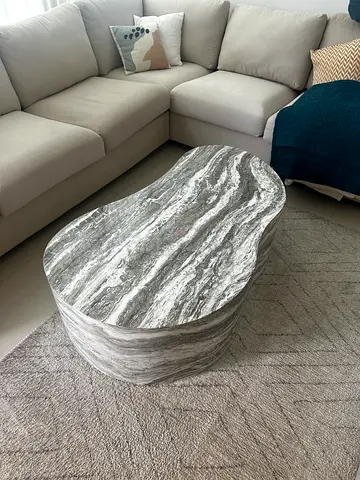 Stone oval coffee table — good condition