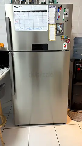 Used stainless steel refrigerator - good condition, top-freezer