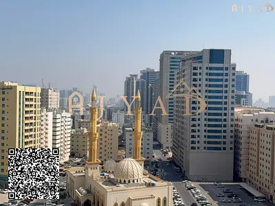 شقة غرفتين وصالة للبيع في برج عجمان ون – إطلالة مدينة وحديقة | جاهزة للسكن مع موقف خاص