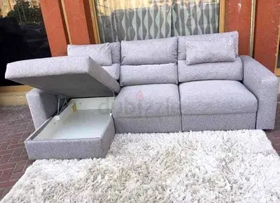 Light grey Ikea sofa-bed with storage