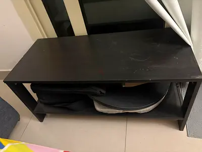 Simple black wooden TV stand / low shelf - good condition
