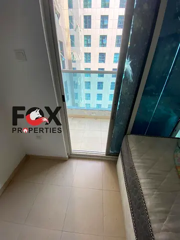One bedroom and living room apartment for annual rent in Ajman Al Nuaimiya 3 City Tower spacious layout with 2 bathrooms balcony prime location and fl